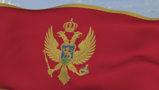 Loop der Montenegro Fahne wehend im Wind als Nahaufnahme 4K