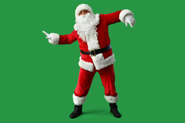 Dancing Santa Claus on green background