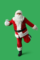 Dancing Santa Claus on green background
