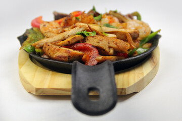 Grilled Steak Chicken Shrimp Fajitas Trio Skillet Perspective Focus