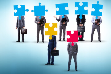 Concept of business people and jigsaw puzzle
