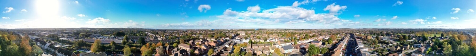 Fototapeta premium High Angle Beautiful Panoramic View of North Luton Leagrave Town of England UK During Mostly sunny Day. The Footage Was Captured with Drone's Camera on November 7th, 2023