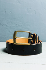Women's black leather belt with a metal buckle. Men's leather belt. Unisex black belt
