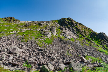 Djevelporten or Devils gate in Floya mountain hiking trail. Svolvaer trekking trail in Lofoten island, Scandinavia, Norway, activity famous places