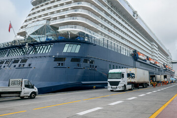 Cruise ship in port is supplied with provisions for the cruise.