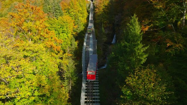 The funicular at the Giessbach Falls from the shore of Lake Brienz to the Grand Hotel in Switzerland in autumn.
