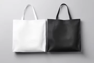 Foto op Canvas Minimalist Black and White Tote Bags on Gray Background © gankevstock
