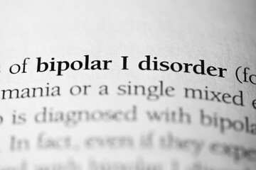 Bipolar I disorder, psychology disorder terminology printed in black on white paper close-up....
