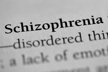 Obraz premium Schizophrenia, psychology disorder terminology printed in black on white paper close-up. medical treatment and therapy. 