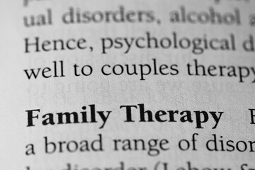 Obraz premium family therapy, psychology counseling term for families, printed in black on white paper close-up