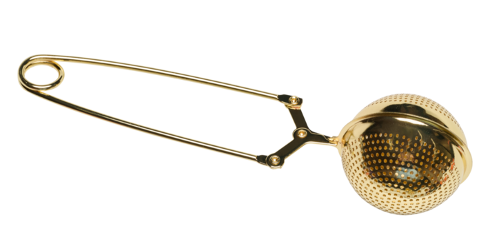Metal golden strainer on a white isolated background