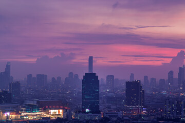Fototapeta premium Bangkok downtown cityscape with skyscrapers at evening give the city a modern style. No focus, specifically.
