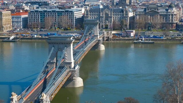 Secheni bridge in summer. A modern Secheni bridge over Danube river against cityscape in Budapest.
