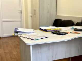 Working office desk with documents.