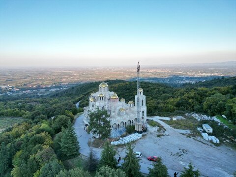 View of the Holy Church of Saint Luke of Simferopol in Veria Greece surrounded by lush trees