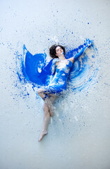 naked sensual woman full of feeling, emotion in blue and white color painted. Decorative creative...
