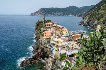 Picturesque view of Italy's Cinque Terre region, featuring the town of Corniglia in the foreground.