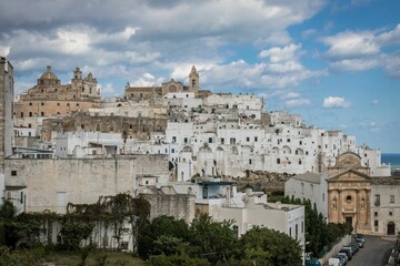 Fototapeta premium Beautiful view of the coastal town of Ostuni nestle on a cliff in Italy