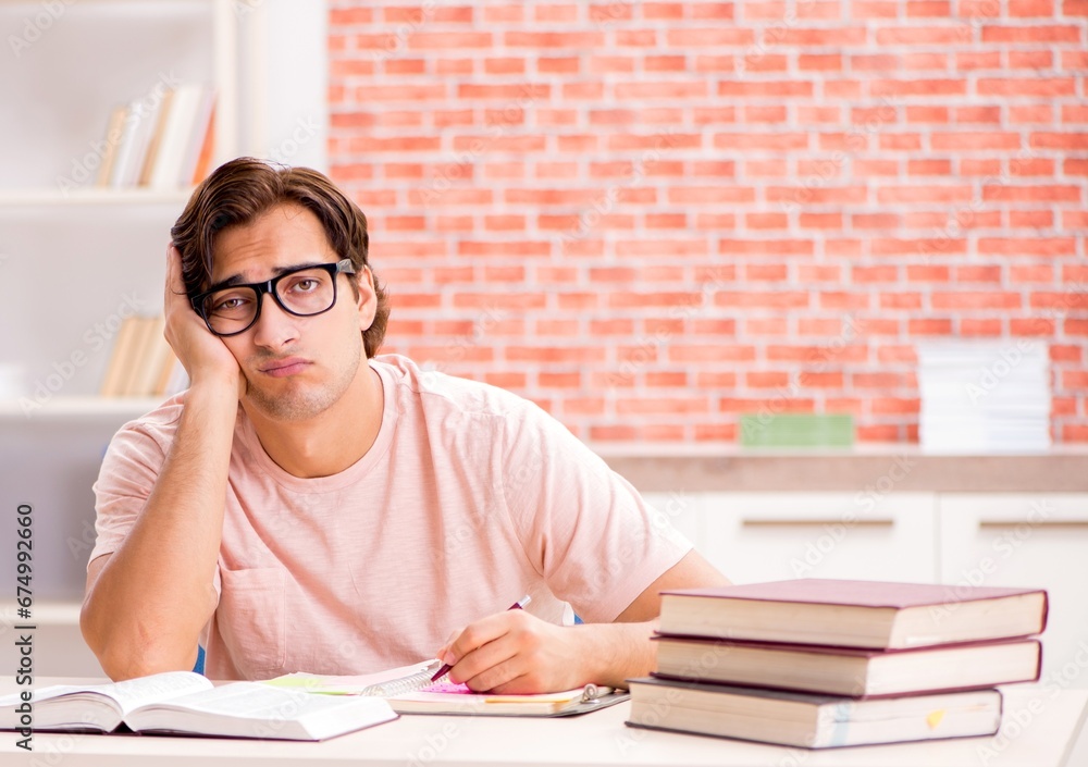 Wall mural young student preparing for college exams