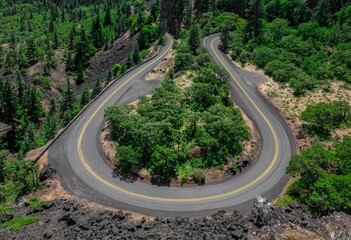Aerial view of a scenic curving road in the Columbia Gorge of Oregon.
