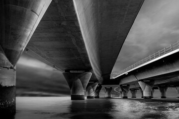 Grayscale shot of the Jaber Al Ahmad causeway in the daylight in Kuwait