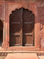 Weathered wooden rustic door from India, associated with the Taj Mahal