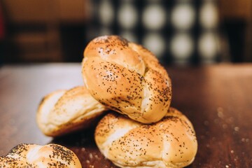 Close-up shot of freshly-baked bagels on a wooden table