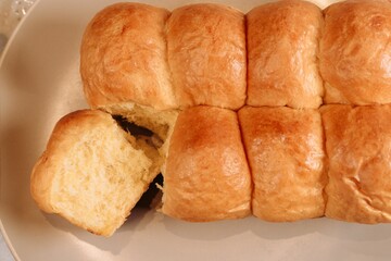 Freshly-baked gourmet bread, with a golden-brown crust and a light, airy crumb