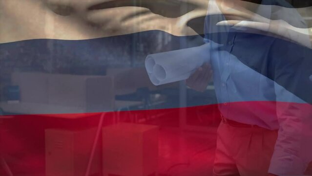 Animation of russian flag over biracial engineer checking floor plan on blueprint - Powered by Adobe