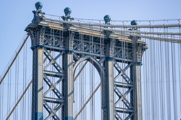 Manhattan Bridge between buildings in the Dumbo neighborhood in Brooklyn, NYC