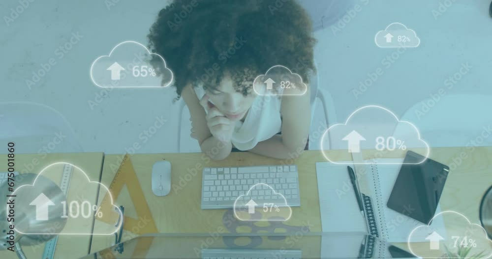 Poster animation of arrow, changing numbers in clouds over biracial woman working on computer