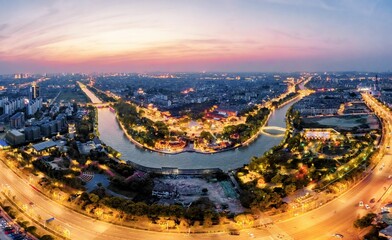 Aerial view of the city night view of Dashuiwan Park, Yangzhou City, China