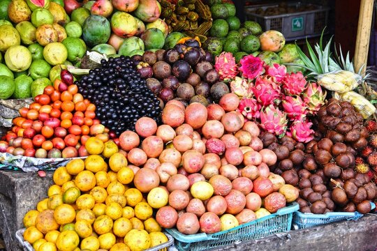 Vibrant selection of tropical fruits from Bali, Indonesia, displayed in a market