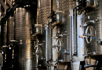 Stainless steel vat room of a wine cellar. Stellenbosch, South Africa.