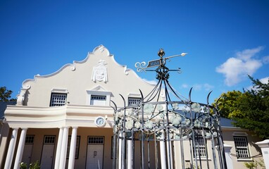 Closeup of Franschhoek architecture historical buildings under the blue sky in South Africa