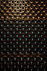 Array of bottles of wine neatly arranged in a classic wine cellar.