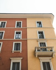Vertical low angle shot of a modern residential building in the city of Milan in Italy