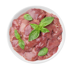 Bowl with raw chicken liver and basil isolated on white, top view