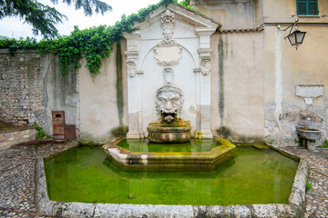 Fototapeta na wymiar Mascherone Fountain - Spoleto - Italy