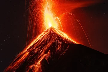 Fotobehang Breathtaking view of the Fuego volcano unleashing its wrath in an epic eruption. Guatemala. © Wirestock