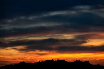 Breathtaking view of Montserrat mountain ridge in Catalunya, Spain at sunset