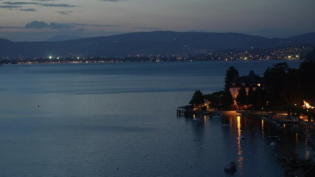 Day to night time lapse at Lake Annecy in the French Alps, Locked wide shot