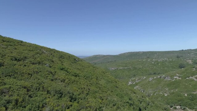 Incredible green mountain ranges in sunlight. Filmed in 4k, drone video.