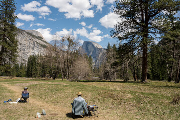 man painting Half Dome in yosemite