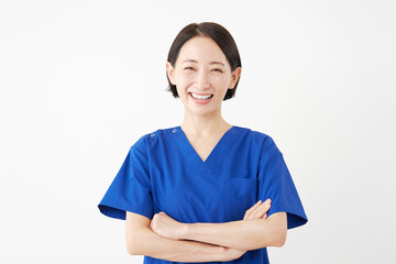 笑顔の女性の医者のポートレート　白背景　カメラ目線