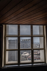 View of buildings in the city center of São Paulo through a window