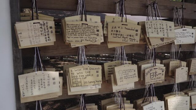 Closeup view of Votive prayer tablets at Japanese shrine Meiji Jingu