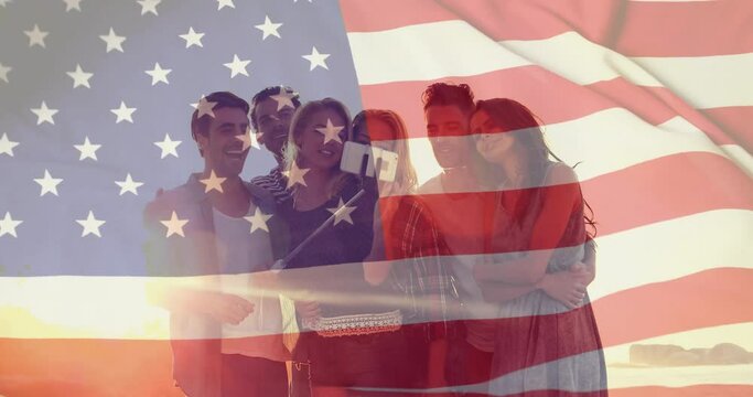 Animation of flag of usa over diverse friends on beach in summer