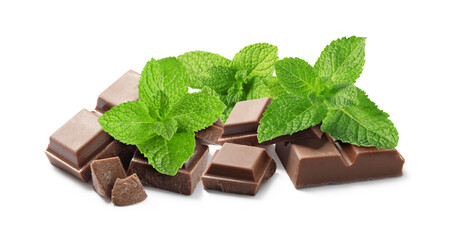 Pieces of milk chocolate and mint leaves isolated on white