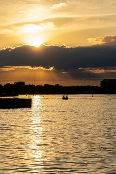 Scenic image of Boat in Lake Ontario during Sunset in Toronto Canada